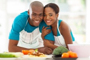 21512965 - cute african american couple in home kitchen