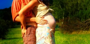 62953536 - pregnant woman belly closeup, natural ethno lifestyle
